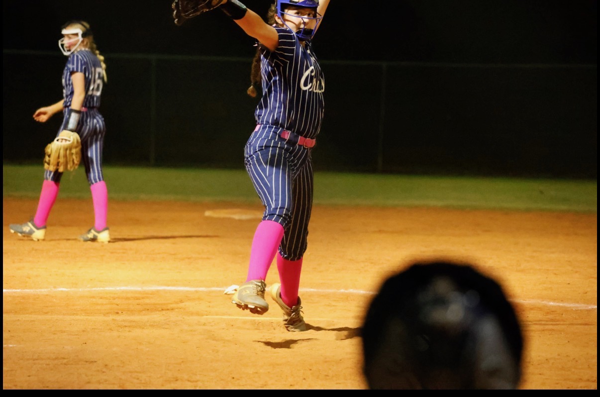 Circle in the lights on a pink-sock night.