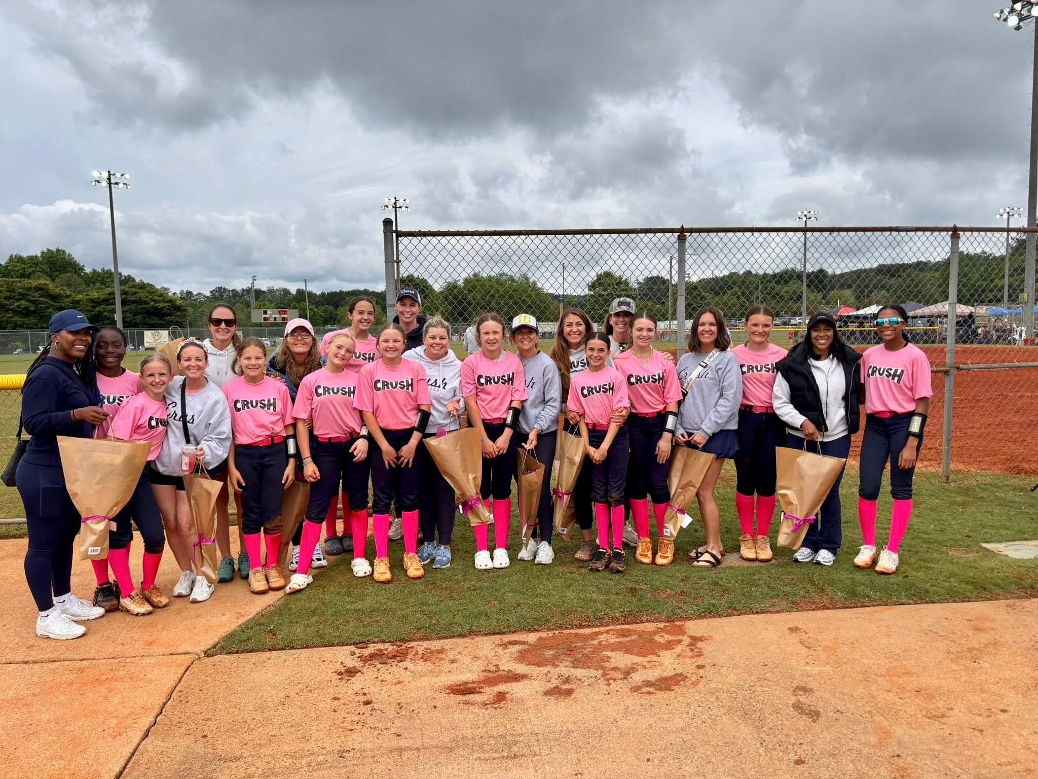 Mother's Day at the field — roses for every Crush mom.
